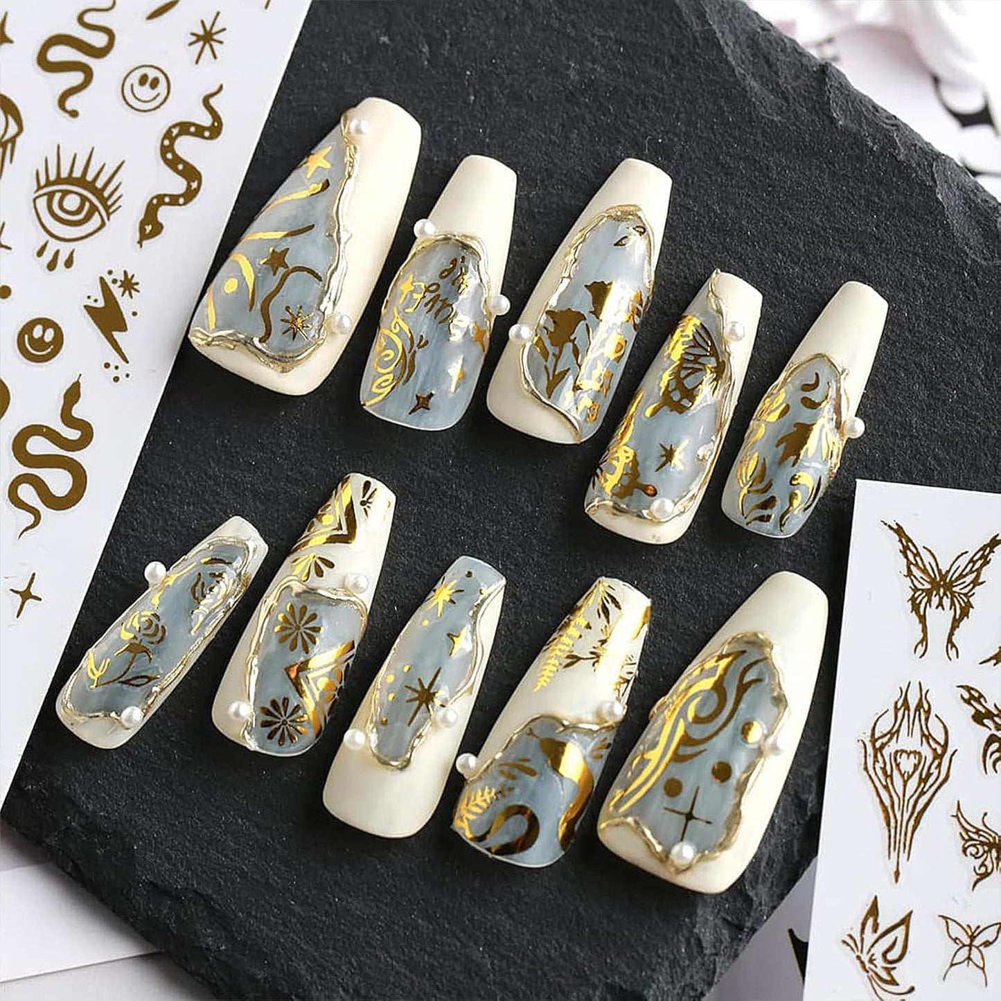 6 Sheet Gold Nail Stickers Black Snake Eyes Leaf Nail Art Stickers 3D Self-Adhesive Bronzing Sun Star Decals Starlight Nail Design Sticker for Acrylic Nail Supplies Women Nail Decorations